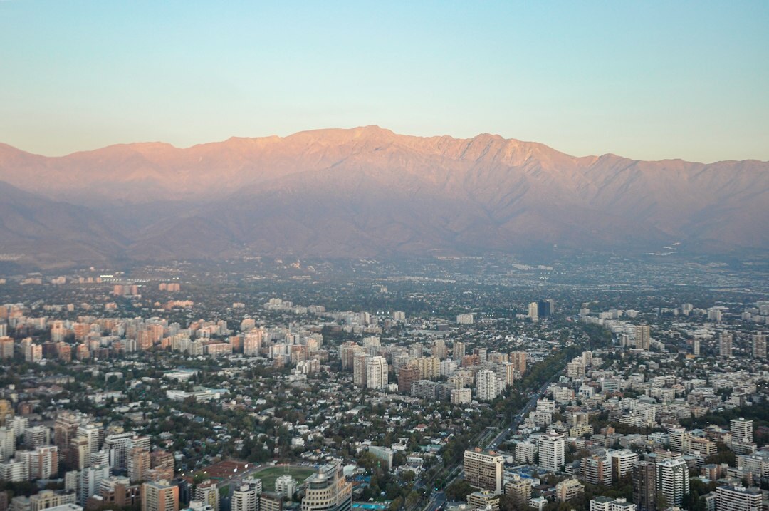 Financial district of Santiago, Chile with the Andes mountains behind